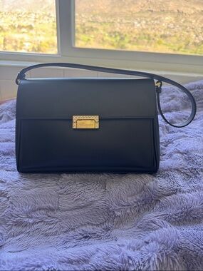 Black Leather Shoulder Bag with Gold Plaque